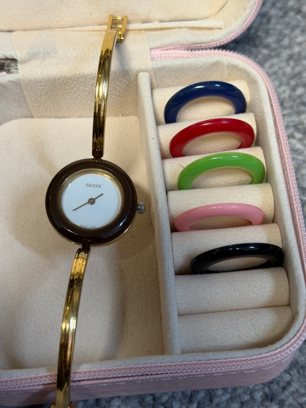 Gucci Gold Bangle Watch with Brown Bezel and Blue, Red, Green, Pink, Black Rings